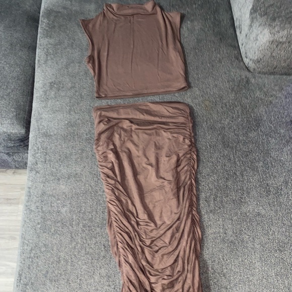 Two piece crop top and scrunched style skirt set